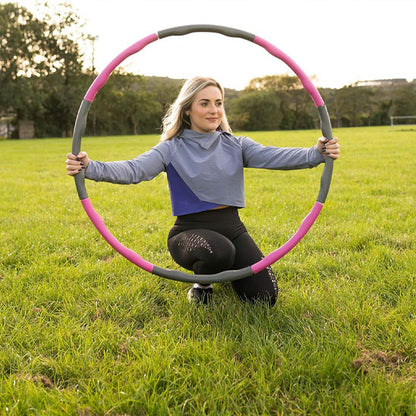 femme avec hula hoop fitness exterieur