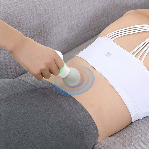 femme pistolet de massage douleur bas du dos